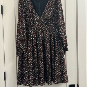 Torrid size 16 dress. Hits right above knee and has deep v neckline. Adorable!